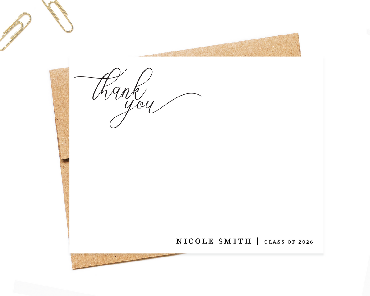 a white card with a personalized message and a name, placed on top of a brown envelope.