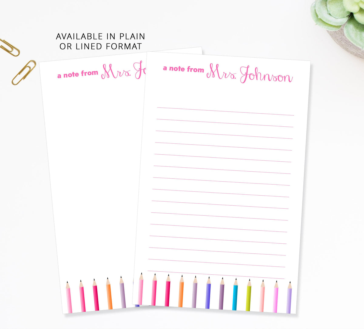 two blank lined notepads with a note from Mrs. Johnson written on them, along with a row of colored pencils on the right side of the notepads.