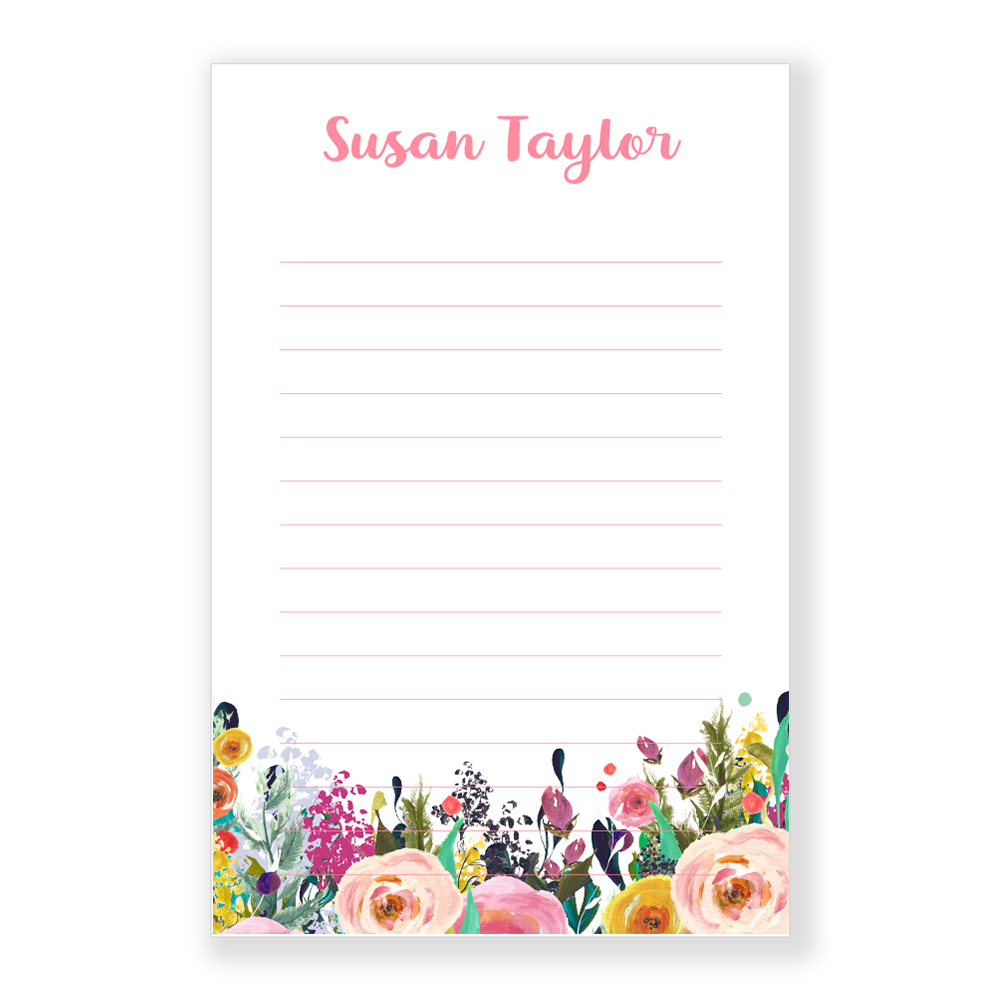 The image is a blank notepad with a floral border on the left side.
