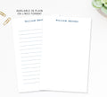 two blank lined paper pads with the name 'William Brooks' printed on them, placed on a white surface.
