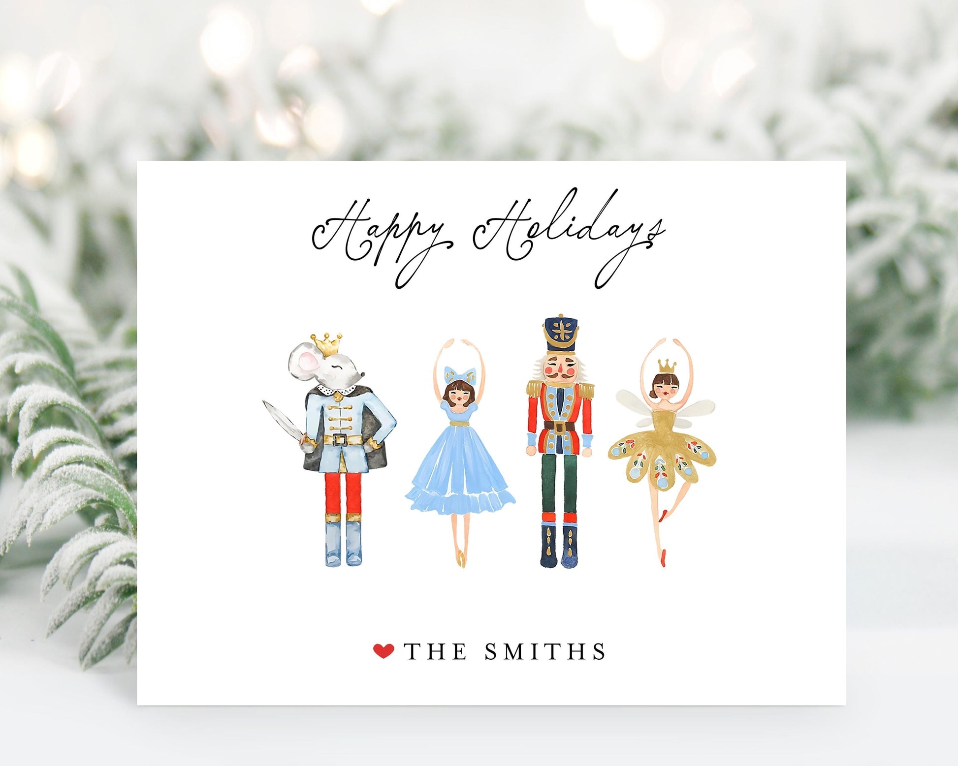 A holiday greeting card featuring four nutcracker characters in different costumes, with the text "Happy Holidays" and "THE SMITHS" printed on it.