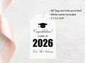 a graduation tag with a graduation cap and the text "Congratulations! CLASS OF 2026 Love The Andersons" printed on it.